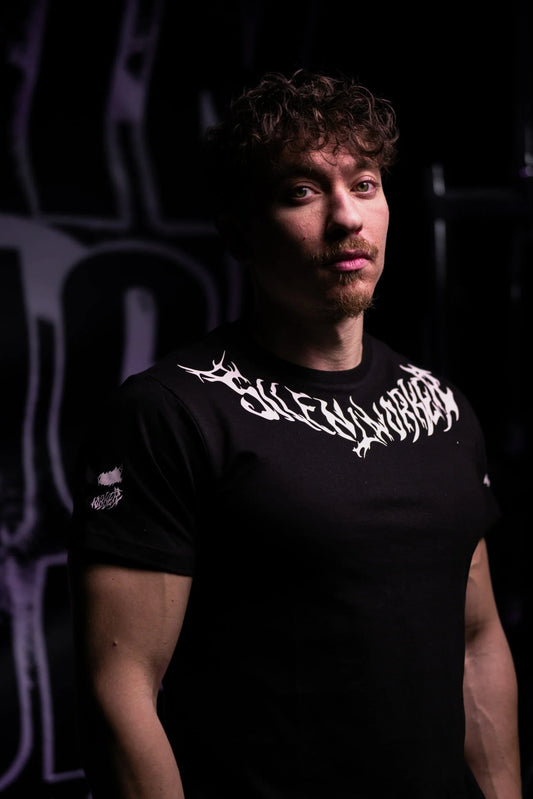 Man wearing Silent Worker powerlifting apparel in gym setting, Hong Kong store