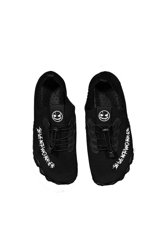 Silent Worker black mesh slippers with white logo text, shown on a marble surface